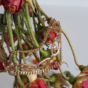 Monet gold-tone triple chain floral bracelet